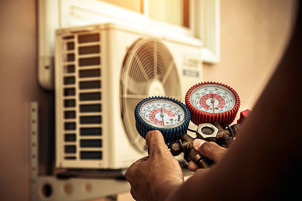 Professional Heat Pump Repair technician working in Spanaway, WA
